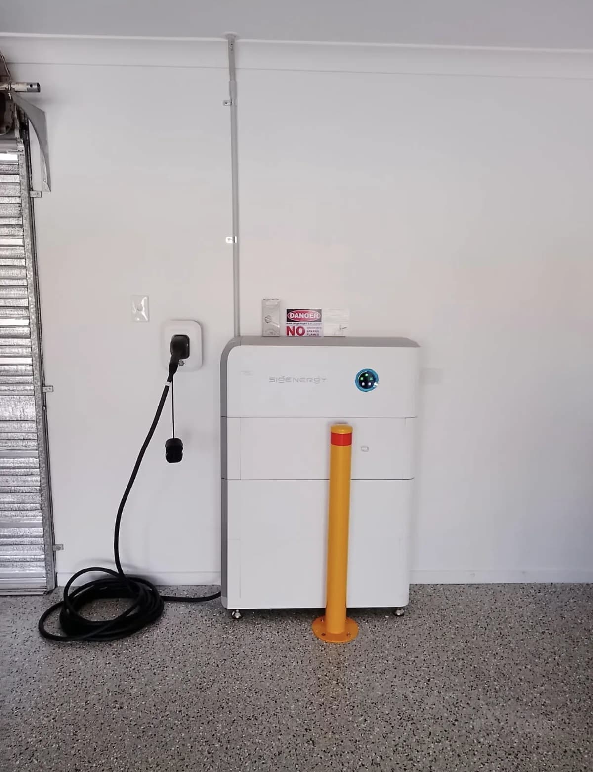 Sigenergy battery stack with an EVDC charging module installed in a Gold Coast garage